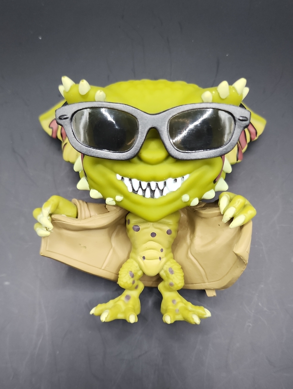 Funko Gremlin Figure with Silver Sunglasses and Tan Coat